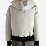 White bomber worn by a person, showing the bomber fit