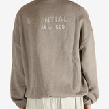 Tan tops worn by a person, showing the tops fit