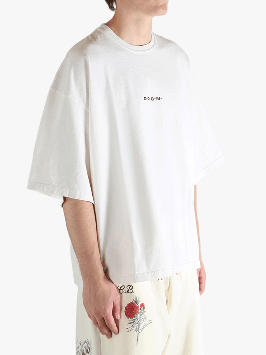 White shirt worn by a person, showing the shirt's fit