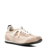 Tan sneakers, side view