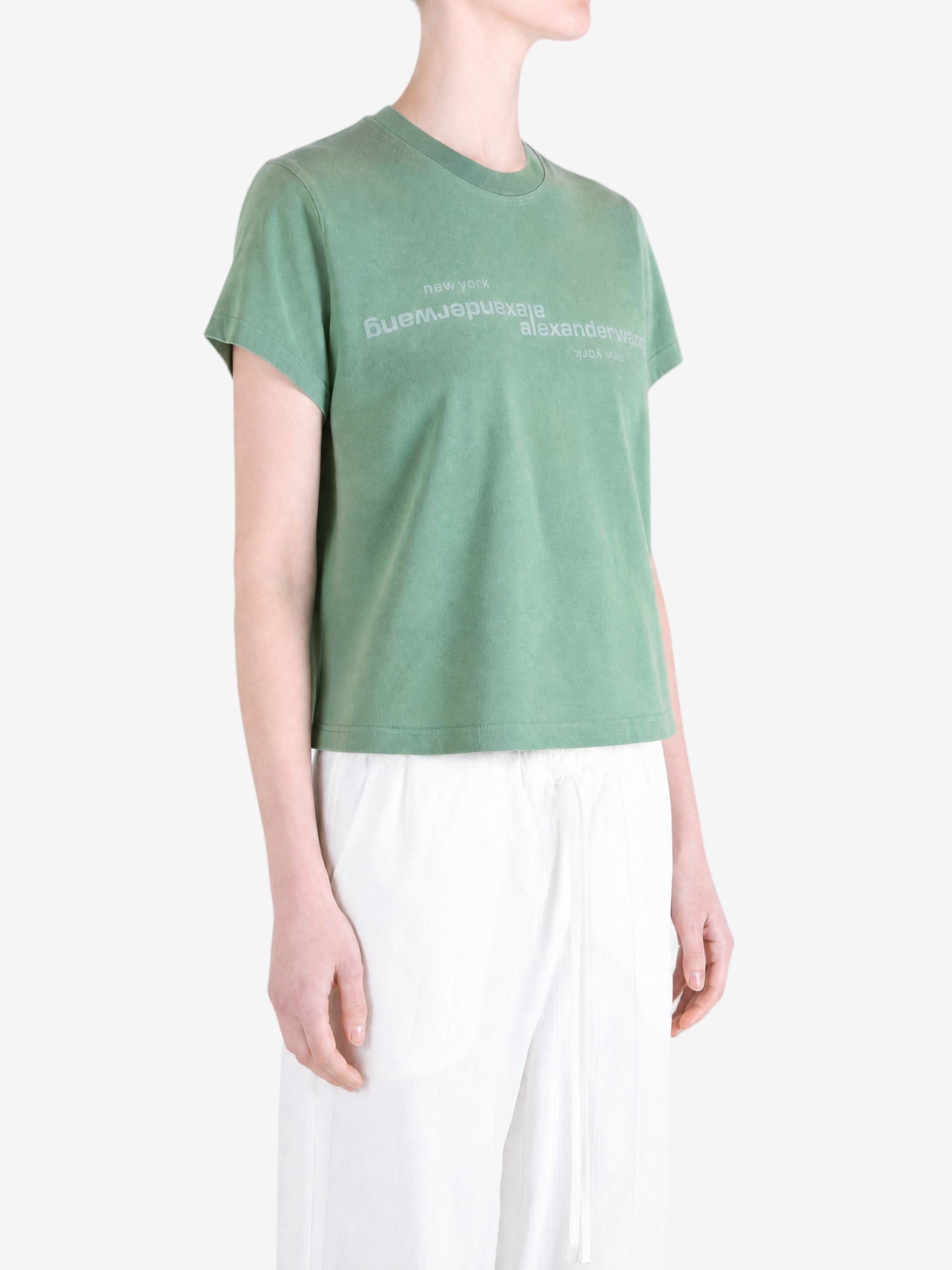 Green top, full body view
