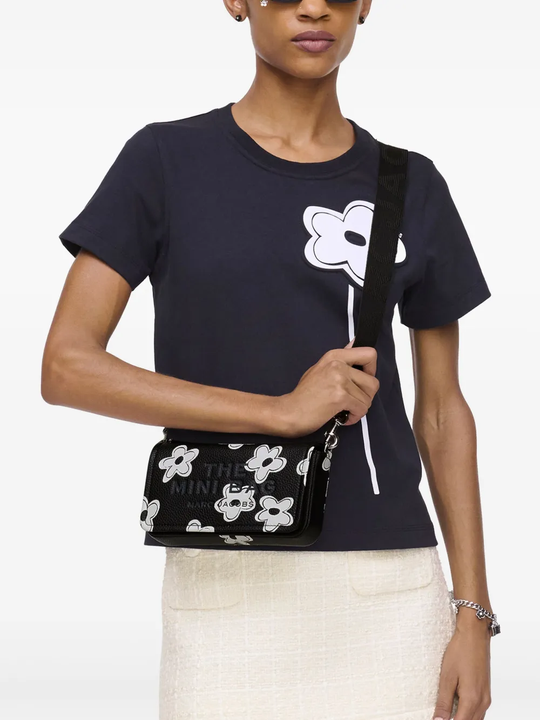 Black bag worn by a person, showing the bag fit