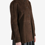 Brown shirts worn by a person, showing the shirts fit