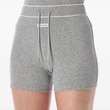Close up of the grey shorts, showing texture of the cotton fabric
