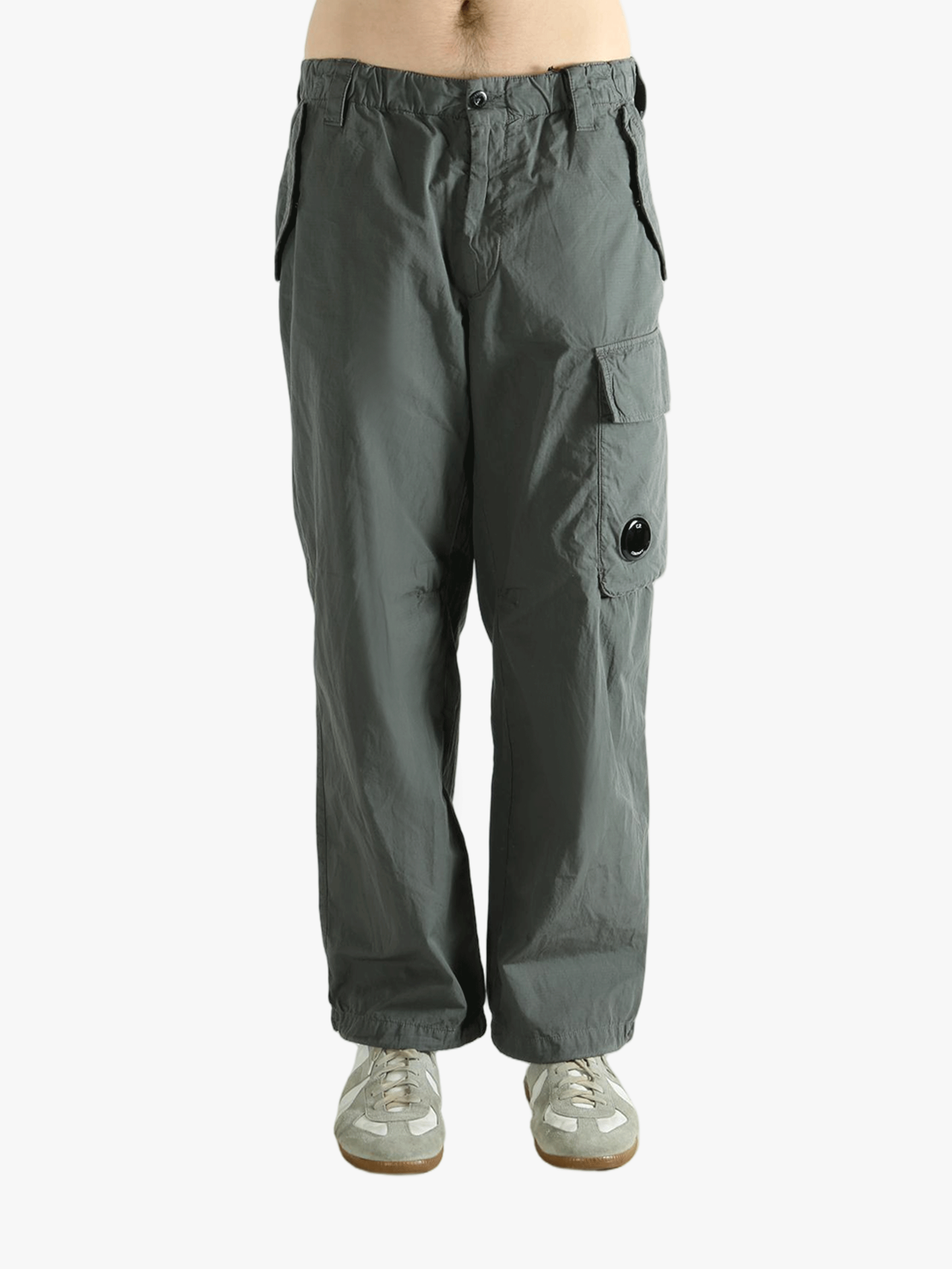Gray cargo pants worn by a person, showing the pants fit