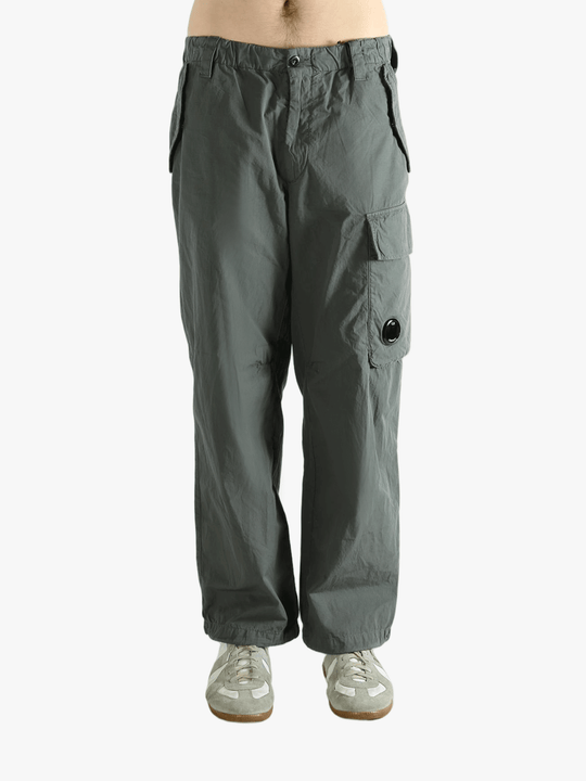 Gray cargo pants worn by a person, showing the pants fit