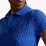 Close up of blue knitted polo shirt,showing texture of the cotton fabric