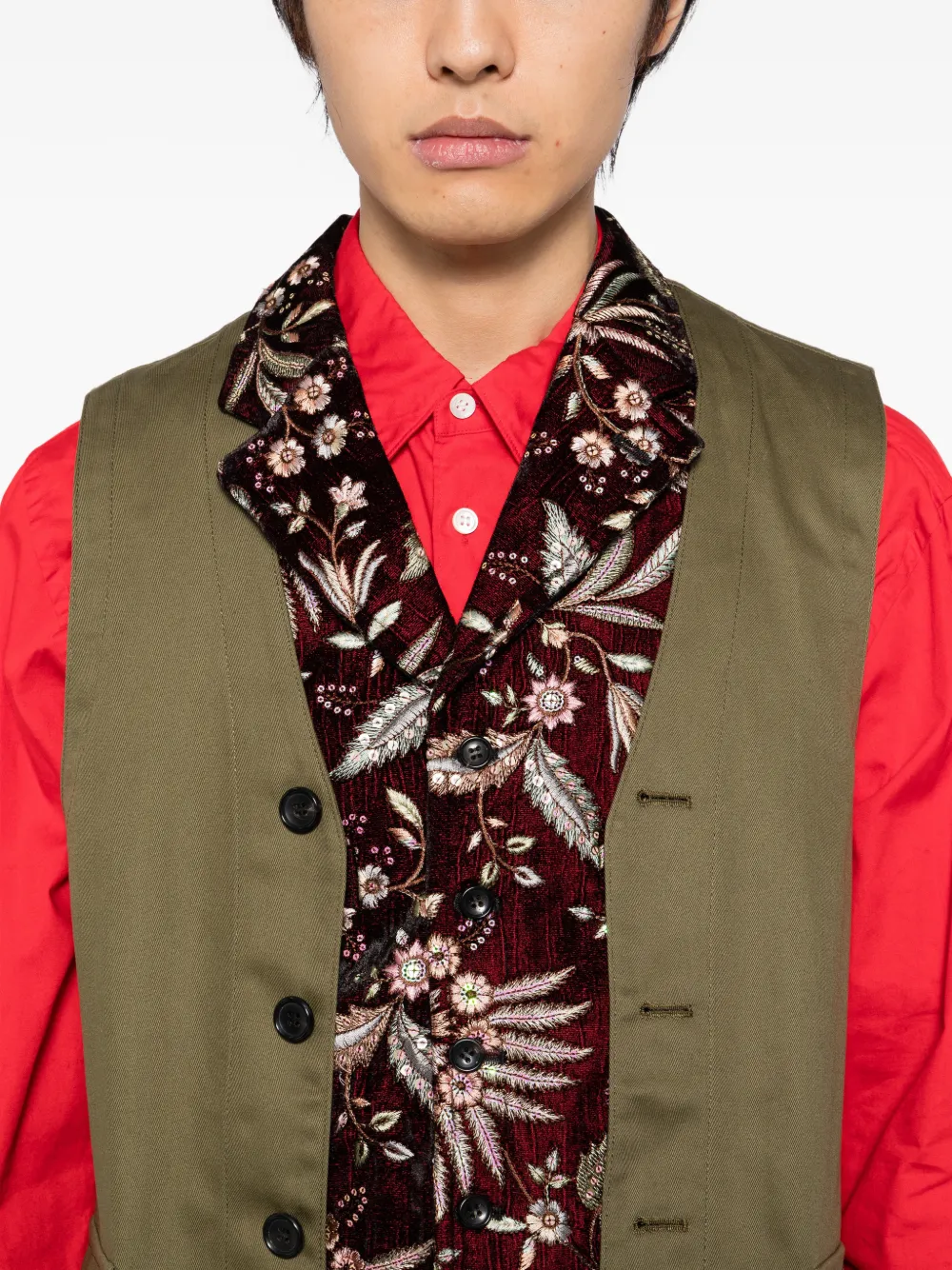 Close up of brown vest,showing texture of the cotton fabric