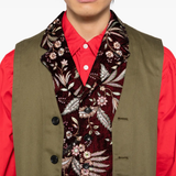 Close up of brown vest,showing texture of the cotton fabric