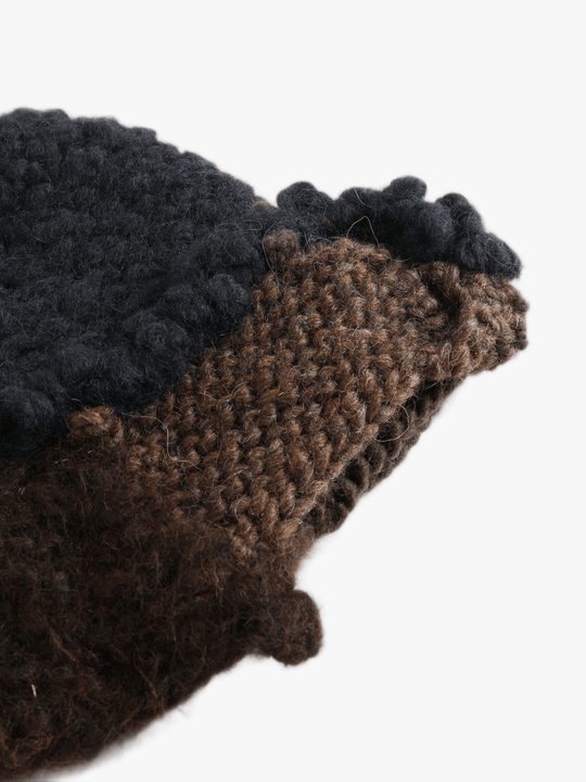 Close up of Brown hat, showing texture of the 100% wool fabric
