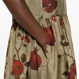 Close up of tan dress,showing texture of the viscose fabric.