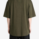 Green top, full body view