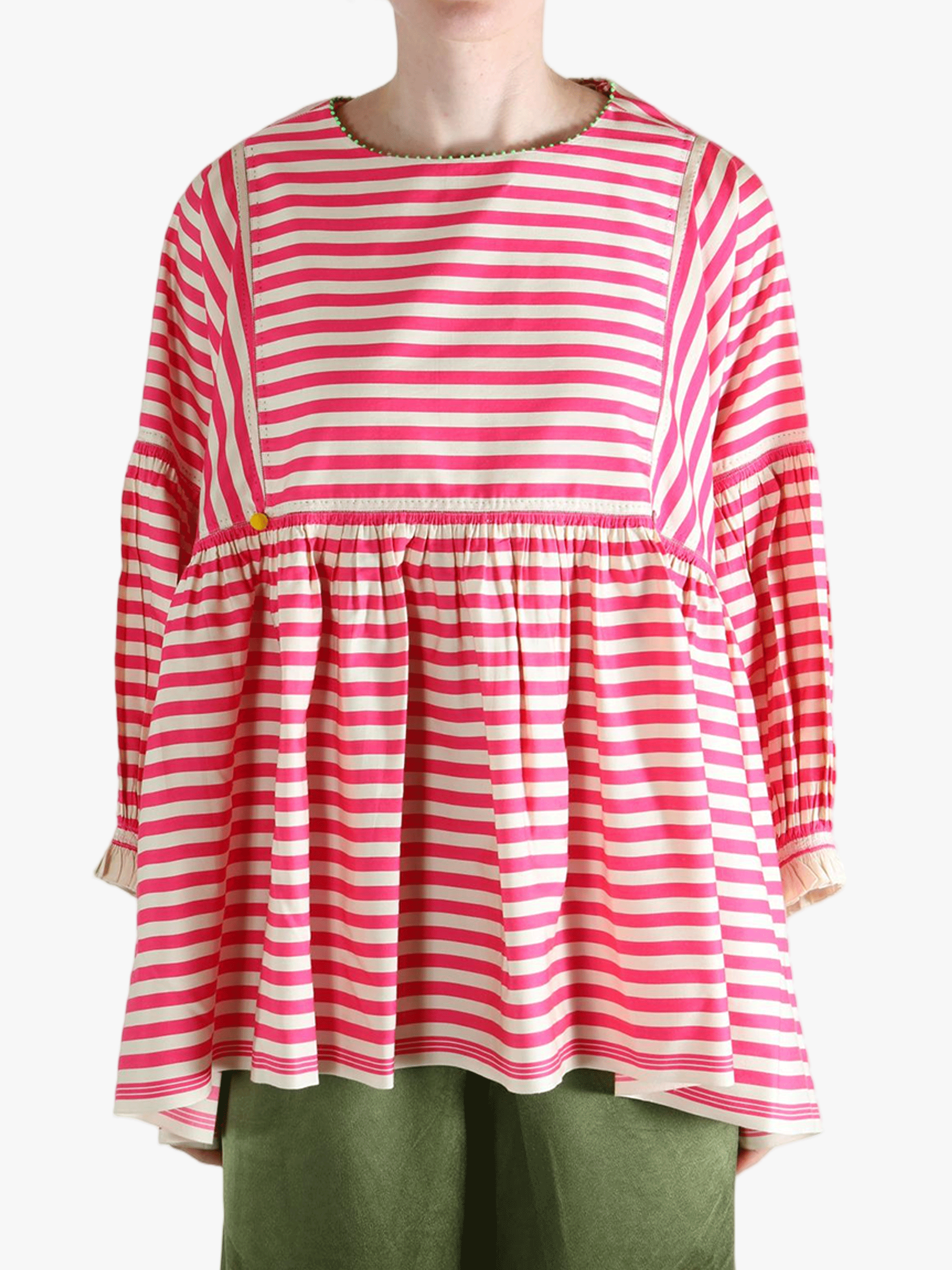 Red top worn by a person, showing the top's fit