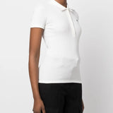 White shirt worn by a person, showing the shirt's fit