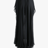 Black skirt worn by a person, showing the skirt's fit