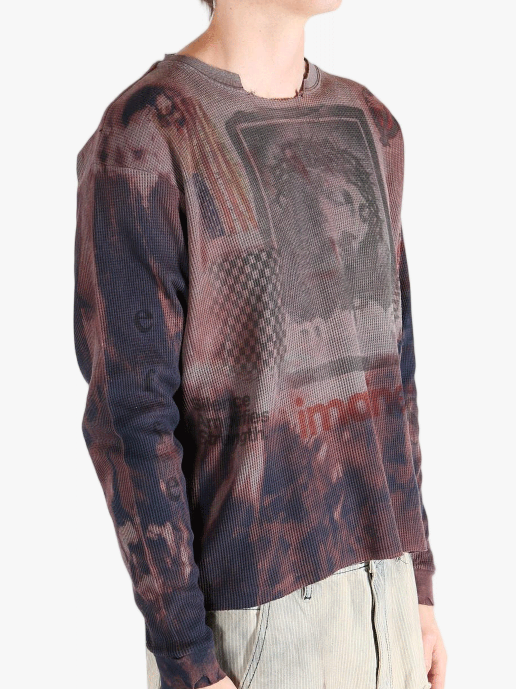 Grey top worn by a person, showing the top's fit