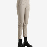Tan pants worn  by a person, showing the pants' fit