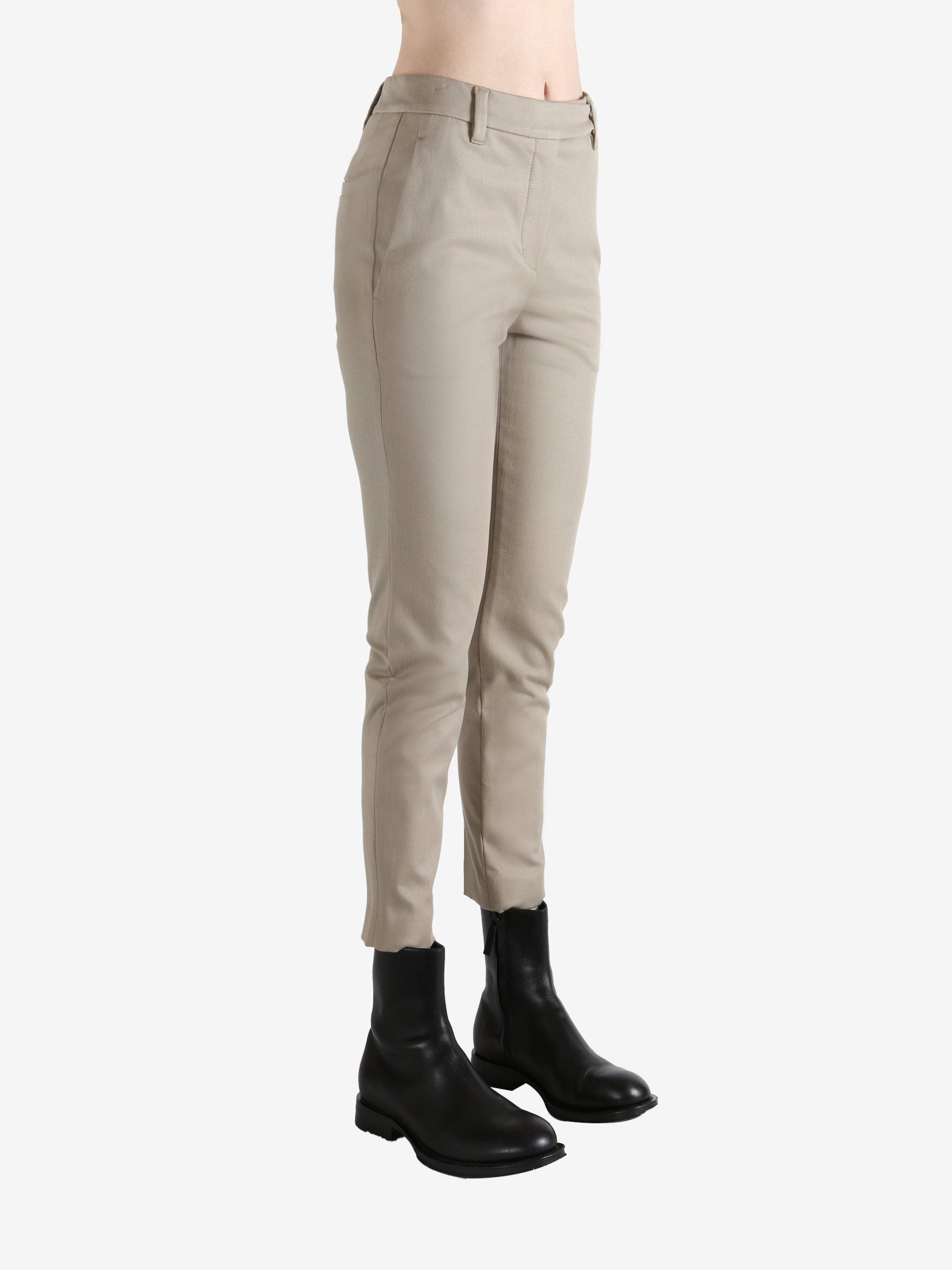 Tan pants worn  by a person, showing the pants' fit
