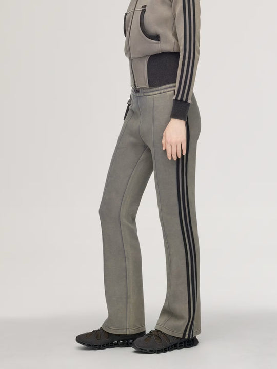 Grey pants worn by a person, showing the pants' fit