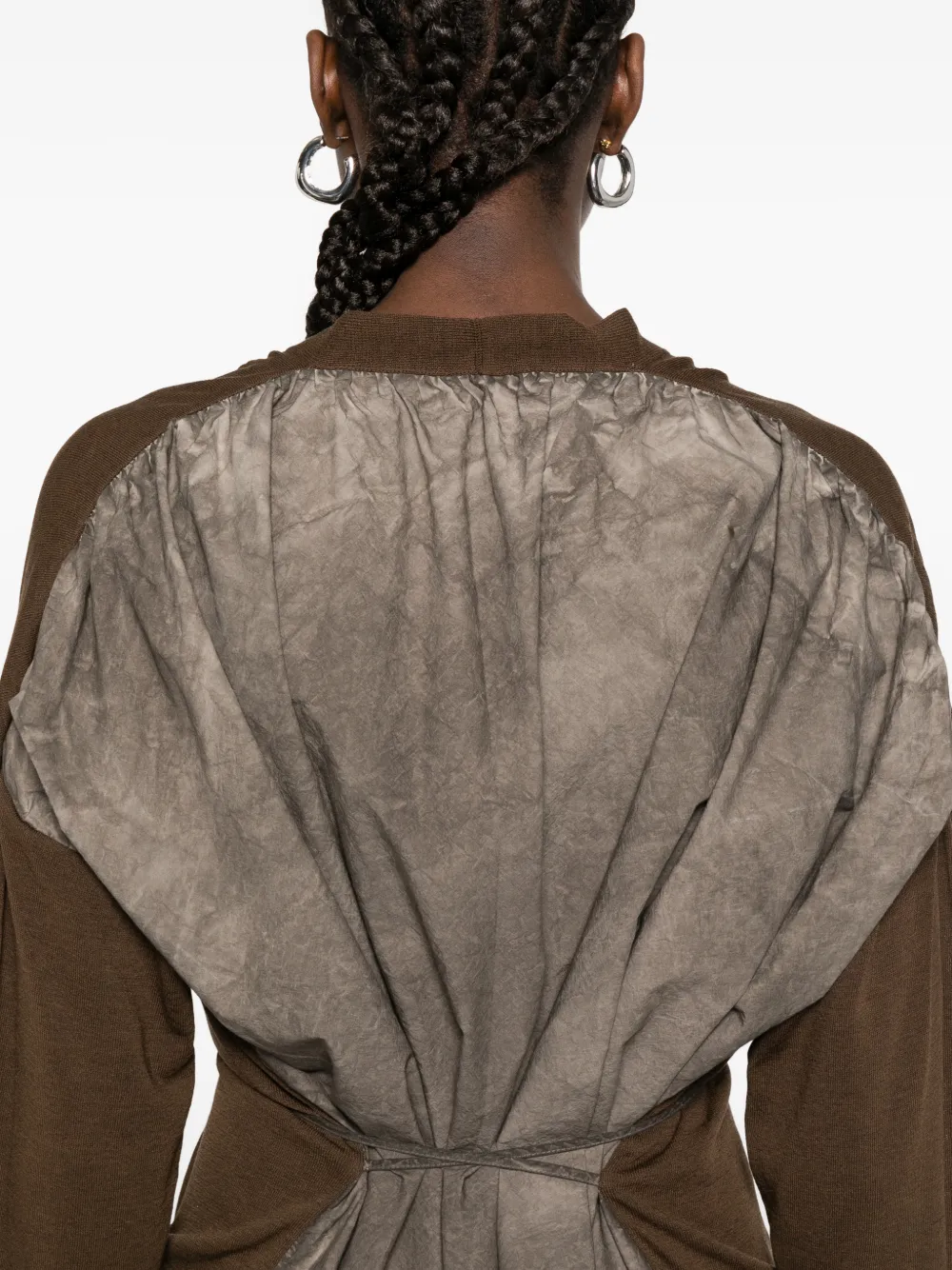 Close up of brown  knitwear, showing texture of the Cotton and Silk  fabric