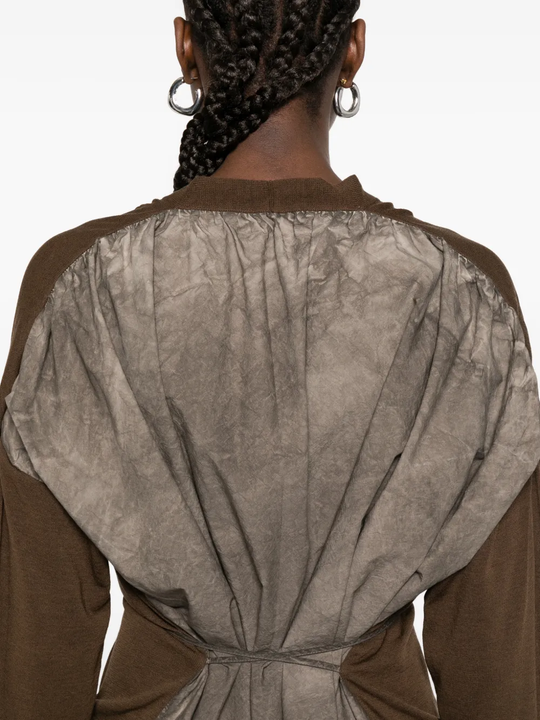 Close up of brown  knitwear, showing texture of the Cotton and Silk  fabric