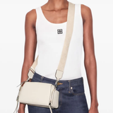 Tan bag worn by a person, showing the bag fit