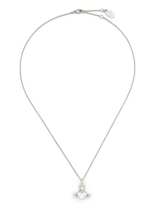 Close up of White pendant, showing texture of the brass fabric
