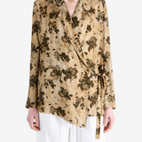 Tan jacket worn by a person, showing the jacket fit