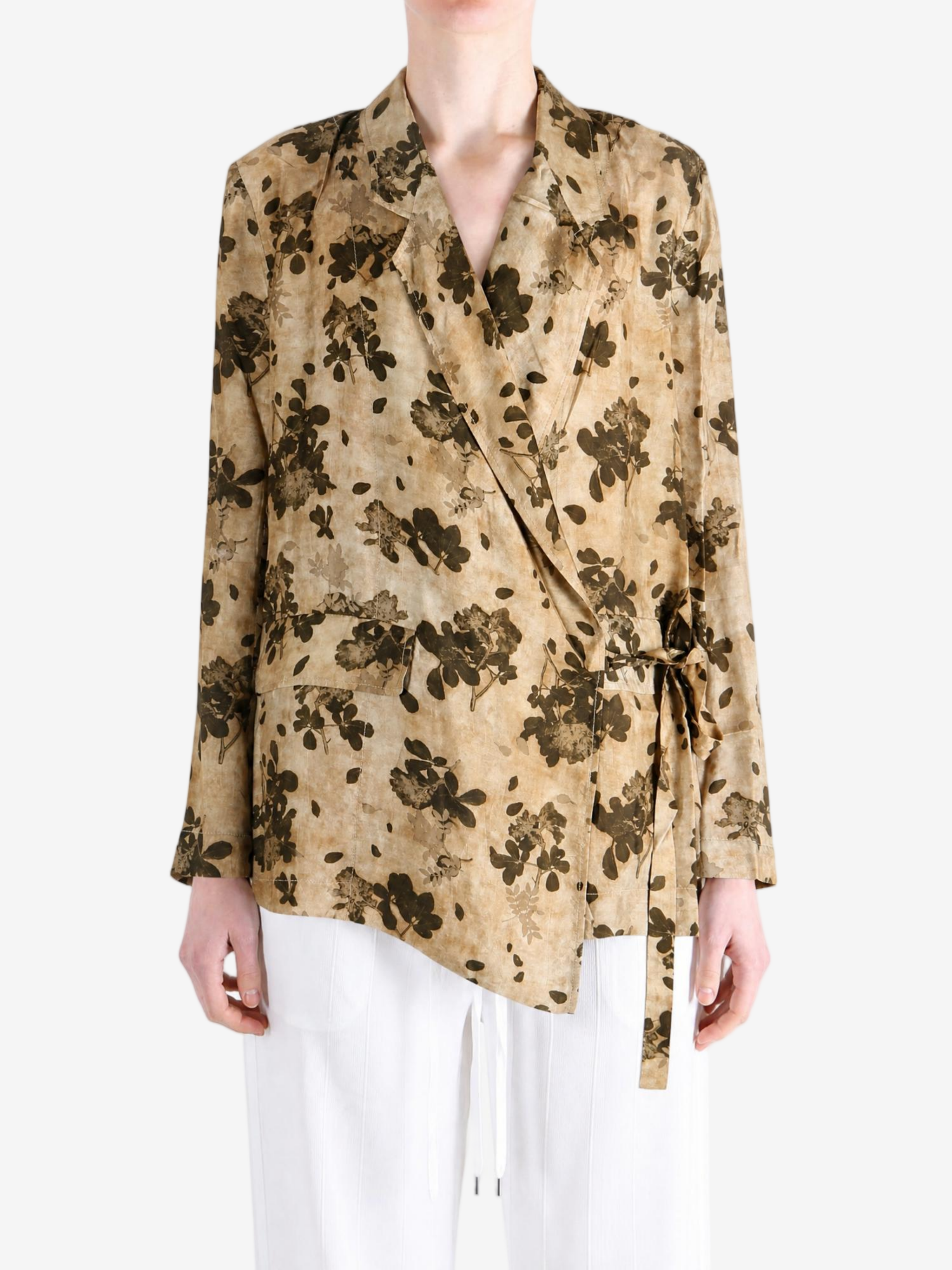 Tan jacket worn by a person, showing the jacket fit
