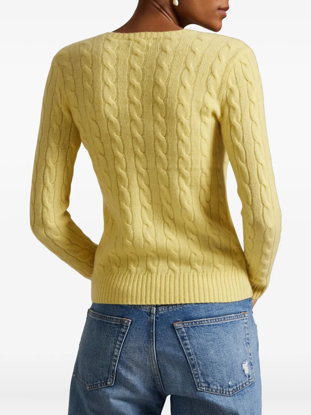 Yellow pullover worn by a person, showing the pullover fit