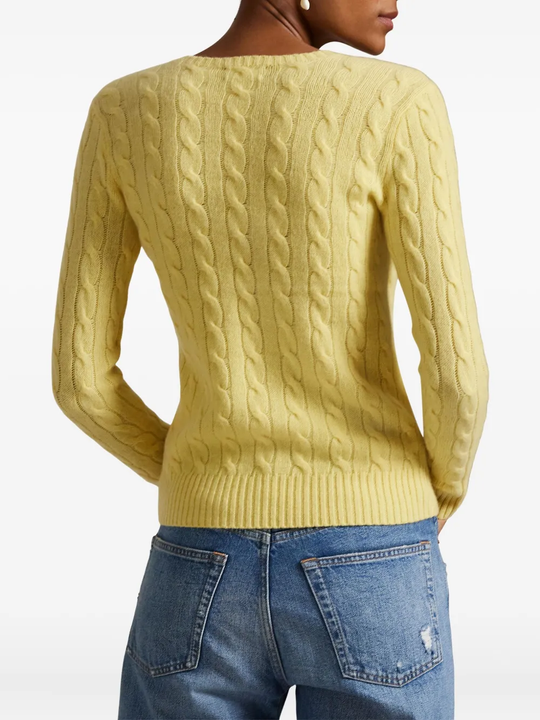 Yellow pullover worn by a person, showing the pullover fit