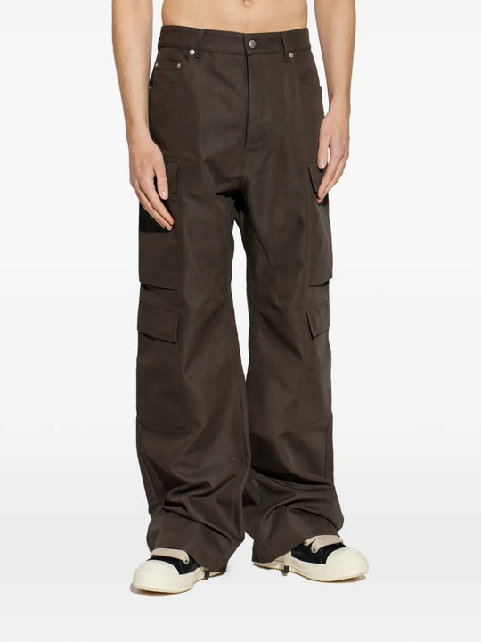 Brown pants worn by a person, showing the pants fit