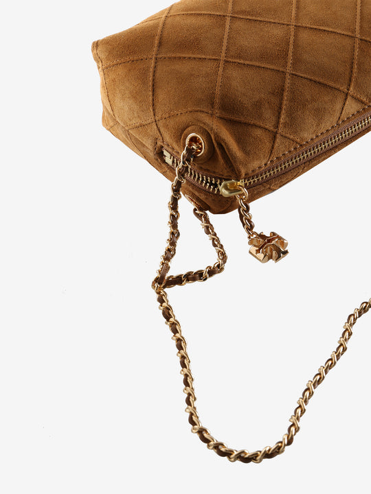 Close up of brown bags, showing texture of the fabric