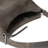 Close up of grey bag,showing texture of th suede fabric.