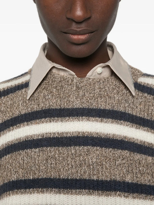 Tan hoodie worn by a person, showing the hoodie fit