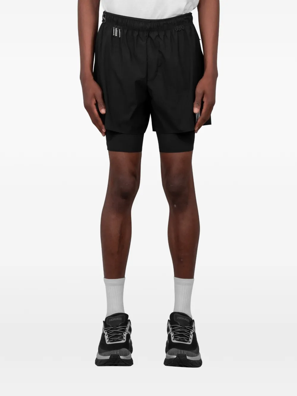 Black shorts, full body view