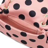 Close up of pink bag,showing texture of the polyester fabric.