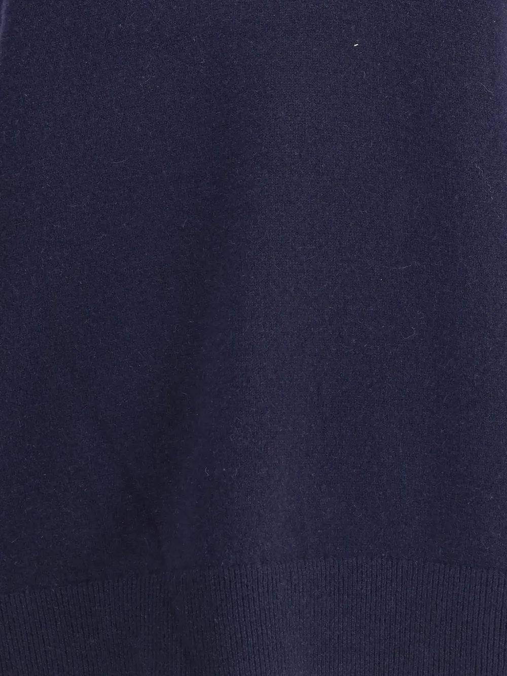 close up of purple tops, showing texture of the cashmere  fabric