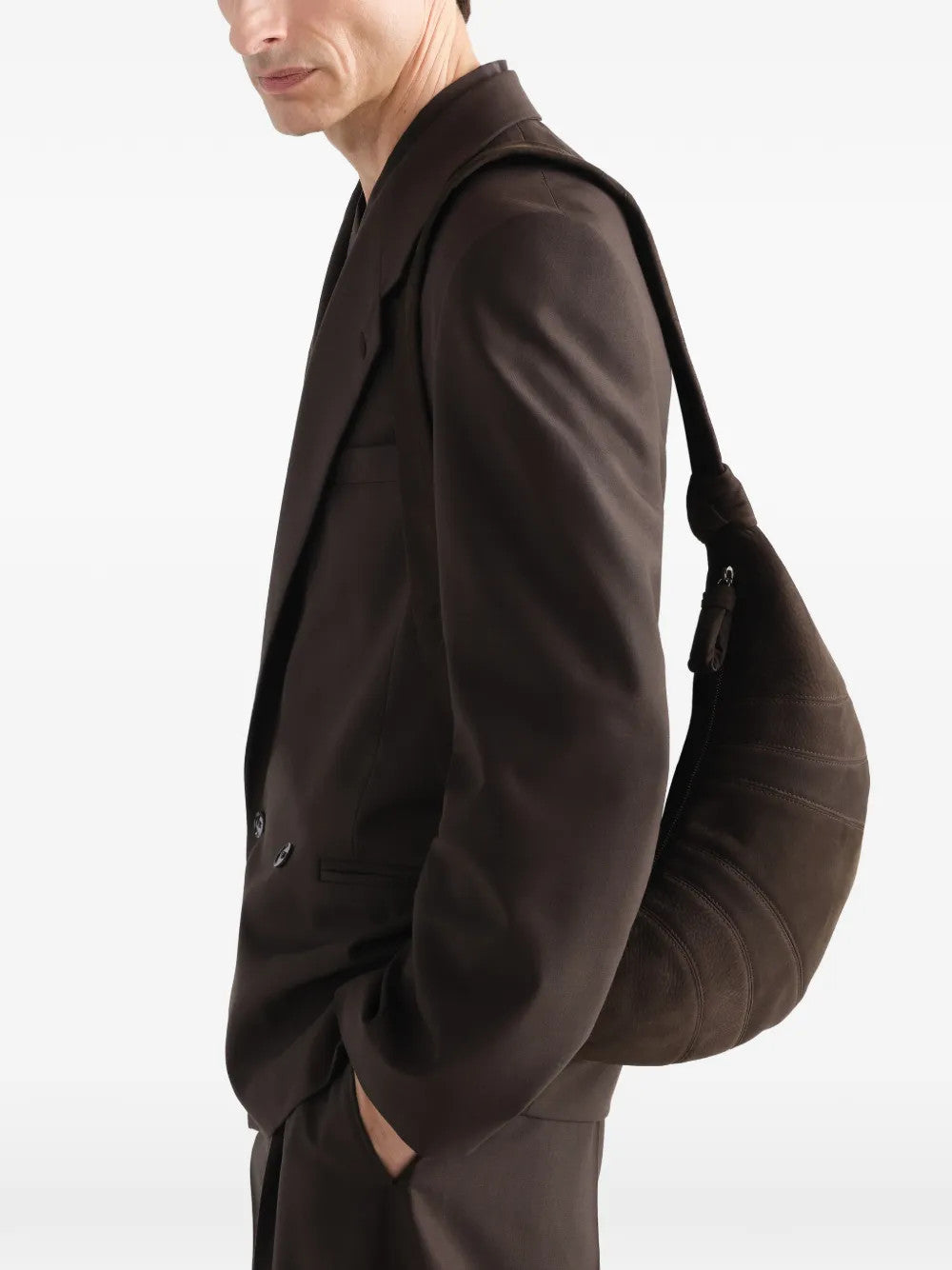 Brown bag worn by a person, showing the bag fit