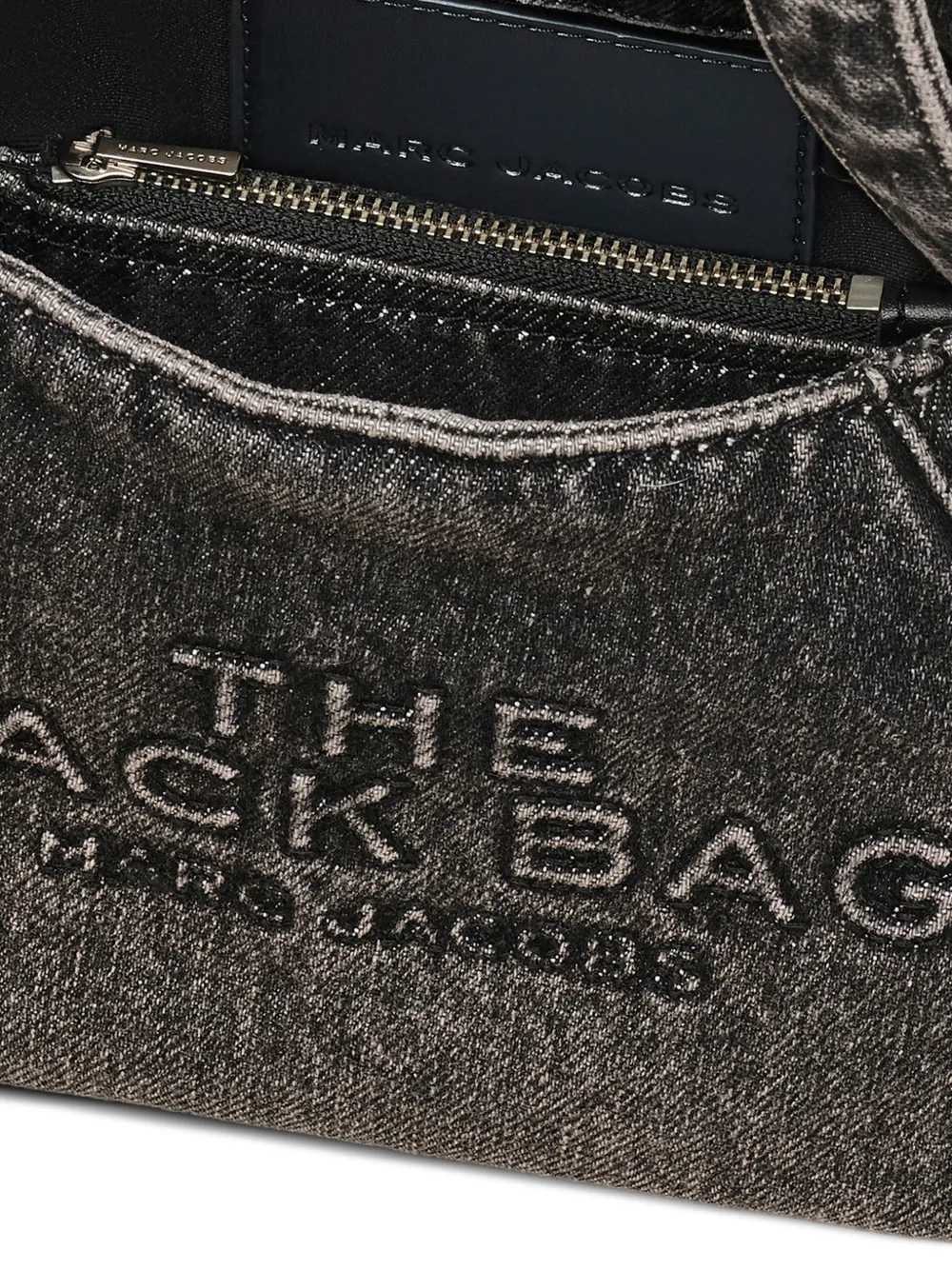 close up of black bags , showing texture of the cotton fabric