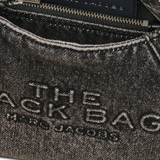 close up of black bags , showing texture of the cotton fabric