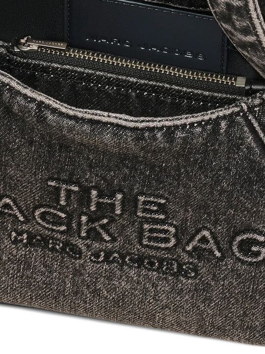 close up of black bags , showing texture of the cotton fabric