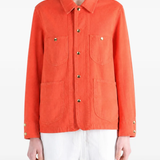 Orange jacket worn by a person, showing the jacket fit