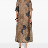 Brown dress worn by a person, showing the dress's fit