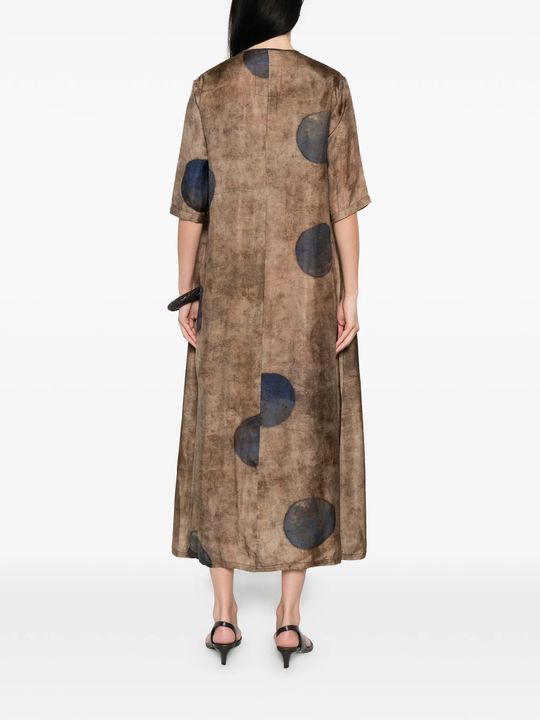Brown dress worn by a person, showing the dress's fit