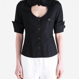 Black shirt worn by a person, showing the shirt fit