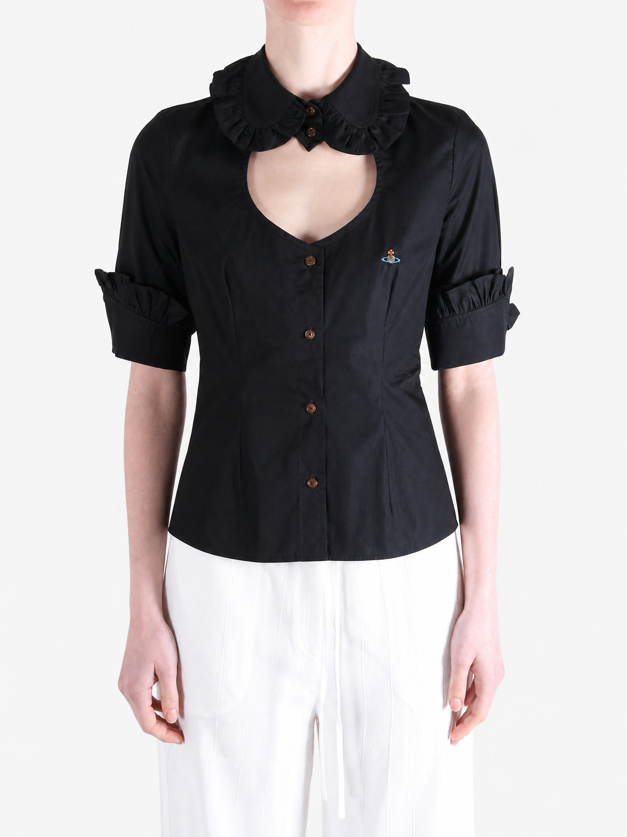 Black shirt worn by a person, showing the shirt fit