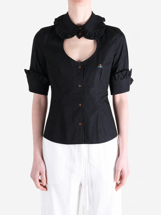 Black shirt worn by a person, showing the shirt fit