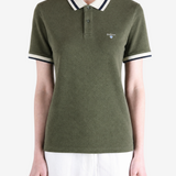 Green shirt worn by a person, showing the shirt fit