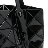 Close up of black bag, showing texture of the PVC fabric